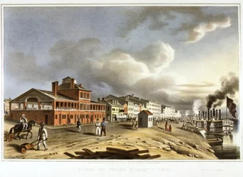 Lithographie horizontale colorée à la main montrant Front Street sur le quai de St. Louis depuis le sud-est. Le bateau à vapeur Alton est montré en tête d